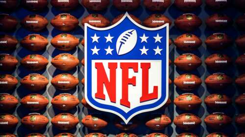 A high-detail, 5K resolution close-up of an American football player in motion during... desktop wallpaper