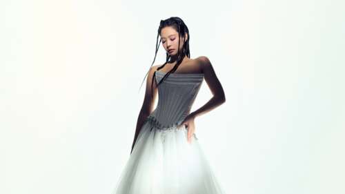 A high-definition, elegant portrait of Jennie Kim from BLACKPINK against a clean... free background