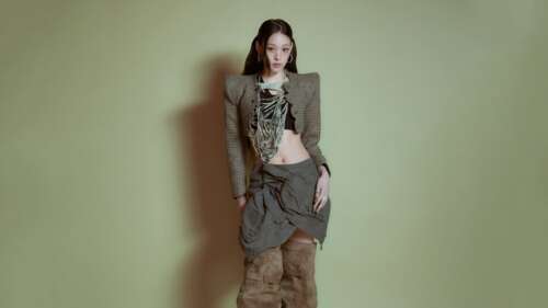 A high-detail portrait of K-Pop singer Annie from the ALLDAY PROJECT, featuring stylish... high definition wallpaper