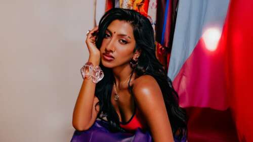 A detailed high-resolution portrait of American singer Lara Raj from the group KATSEYE. wallpaper photo gallery download