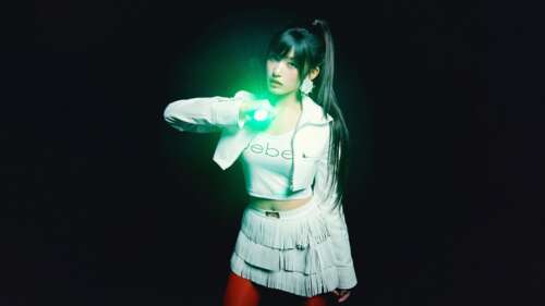 A high-resolution, dramatic portrait of Leeseo from the K-pop group IVE against a... hd background