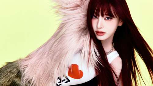 A high-resolution close-up portrait of Liz from the K-pop group IVE, featuring a... free wallpaper