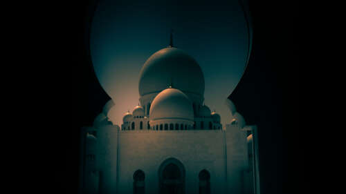 A stunning architectural view of the Sheikh Zayed Grand Mosque in Abu Dhabi, featuring... background images hd