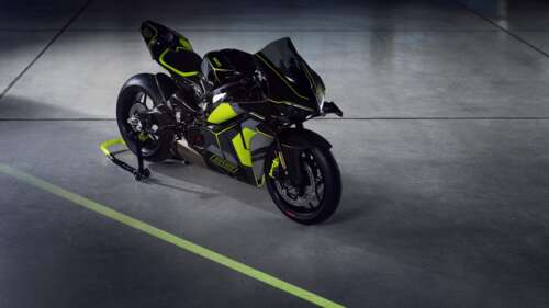 A Lamborghini supercar and a Ducati Panigale V4 motorcycle captured in a dark, high-contrast... wallpaper download