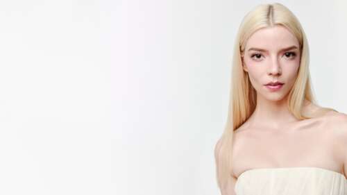 High-resolution 5K portrait of blonde actress Anya Taylor-Joy on a white background wallpaper for pc download