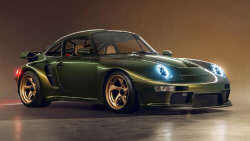 A high-resolution, detailed view of a classic Porsche 911 sports car showcasing its...
