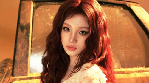 A high-detail 5K close-up portrait of K-pop singer Yuqi from the group (G)I-dle. wallpaper