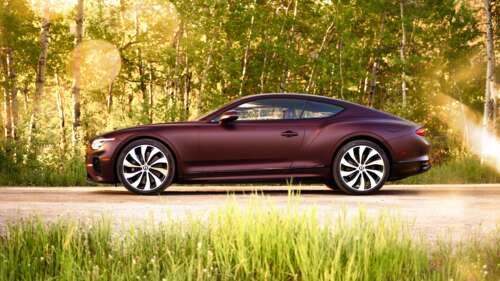 A sleek and polished 2025 Bentley Continental GT luxury coupe showcasing high-end... wallpaper download