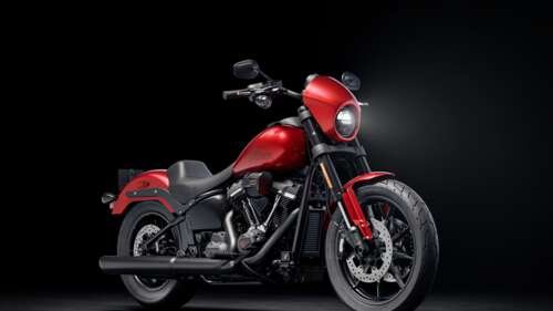A 2025 Harley-Davidson Low Rider cruiser motorcycle against a dark, moody background... free background images