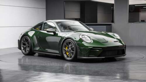 A detailed, high-resolution view of the 2025 Porsche 911 GT3 Touring, emphasizing... wallpaper