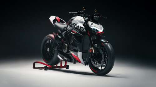 A high-detail, cinematic shot of a Ducati Streetfighter V4 motorcycle featuring a... wallpaper