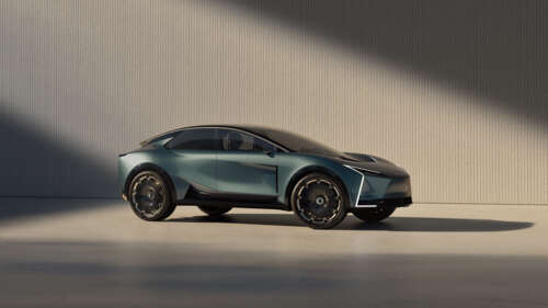 A futuristic 2025 concept car with a sleek, aerodynamic metallic body and integrated... free wallpaper