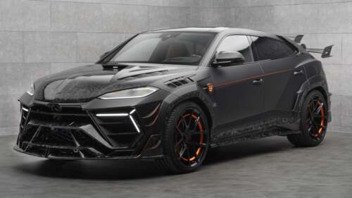 Mansory Venatus Lamborghini Urus SE luxury SUV with aggressive body kit on a grey... wallpaper