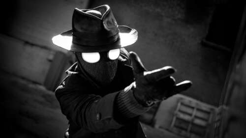 A high-contrast, monochrome close-up of Spider-Man Noir in a dark, cinematic detective... pictures for wallpaper