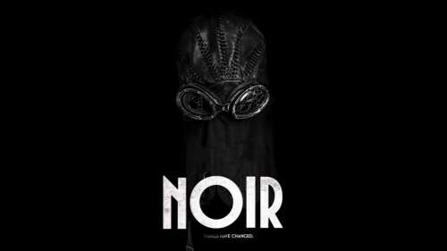 Dramatic close-up of Spider-Noir from Marvel against a pitch-black background. wallpaper