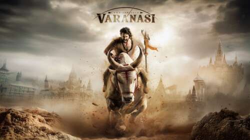 A high-resolution 5K cinematic wide shot of Varanasi in 2027, featuring dramatic... wallpaper