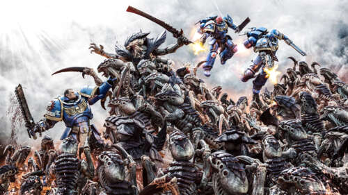 A heavily armored Ultramarine Space Marine from Warhammer 40,000: Space Marine 2... wallpaper download