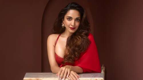 Kiara Advani wearing a beautiful red saree with red lips free wallpaper