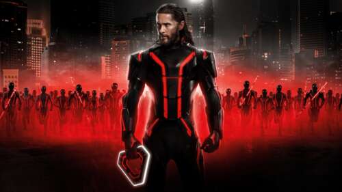 An ultra-wide cinematic view of the character Ares from Tron: Ares, surrounded by... high definition wallpaper