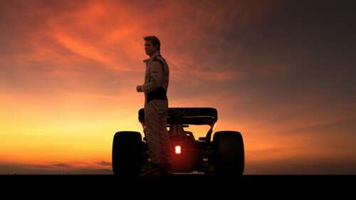 Brad Pitt posing against a dramatic sunset backdrop for the 2025 movie F1. wallpaper images