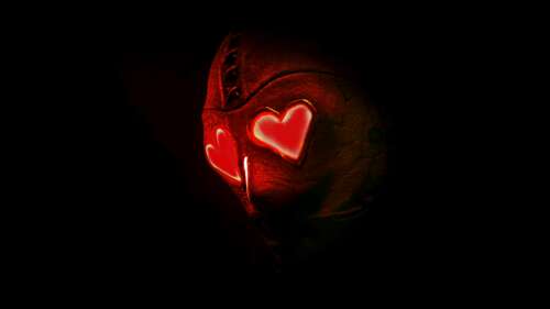 A dark, mysterious shadowy figure surrounded by floating red hearts in a horror-themed... wallpaper