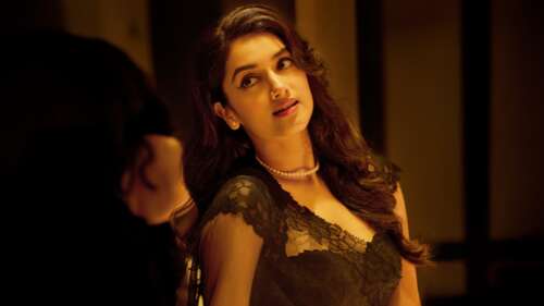 Indian actress Bhagyashri Borse posing gracefully in a stylish black saree free wallpaper