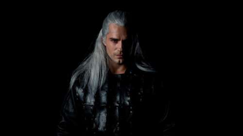 Cinematic portrait of Geralt of Rivia (Henry Cavill) from The Witcher series against... wallpaper for laptop download