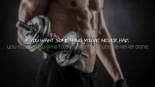 A muscular bodybuilder lifting heavy dumbbells during an intense weightlifting session. wallpaper