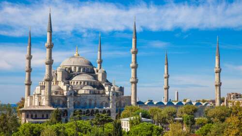 A grand view of the Blue Mosque (Sultan Ahmed Mosque) in Istanbul, featuring its... wallpaper