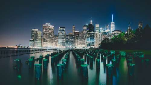 A high-resolution night view of the illuminated Manhattan skyline in New York City... high definition wallpaper