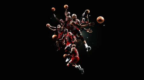 A striking, high-definition portrait of NBA legend Michael Jordan against a solid... wallpaper