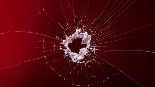 High-resolution image of shattered glass shards over a deep red background, simulating... wallpaper for pc download