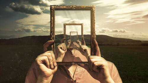 An ornate, decorative frame surrounding a surreal landscape of floating mountains... free wallpaper