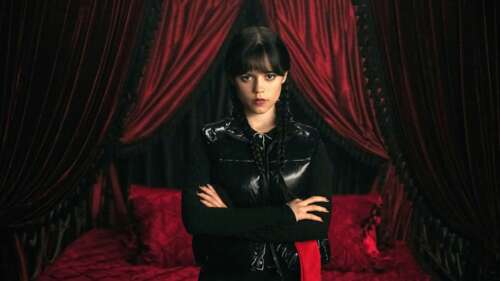 Jenna Ortega as Wednesday Addams in a moody, gothic setting from the Netflix series... wallpaper download