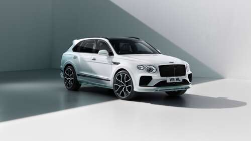 A sleek and luxurious white 2025 Bentley Bentayga Speed SUV. wallpaper