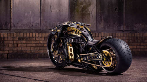 A detailed shot of a chrome-accented Harley-Davidson cruiser motorcycle. free background