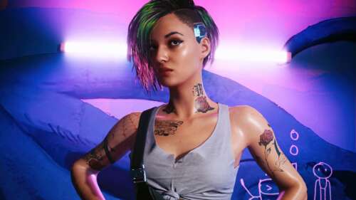 Judy Alvarez from Cyberpunk 2077 in a neon-lit environment. wallpaper