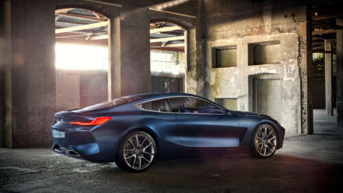 A sleek and futuristic BMW Concept 8 Series luxury car featuring aerodynamic lines... 4K (Ultra HD) background images hd