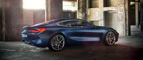 A sleek and futuristic BMW Concept 8 Series luxury car featuring aerodynamic lines... UWUHD free hd wallpapers
