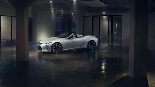 A sleek white Lexus LC 500 supercar captured in a high-quality automotive shot showing... 4K (Ultra HD) wallpaper for laptop download