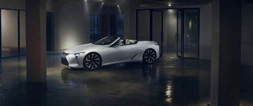 A sleek white Lexus LC 500 supercar captured in a high-quality automotive shot showing... free hd wallpapers