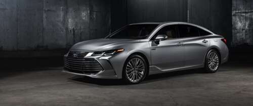 A close-up shot of a silver Toyota Avalon sedan with a metallic finish. wallpaper