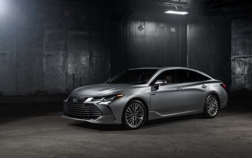 A close-up shot of a silver Toyota Avalon sedan with a metallic finish. 7680x4800 free hd wallpapers