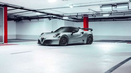 A close-up view of a sleek Alfa Romeo 4C sports car highlighting its aerodynamic... 4K (Ultra HD) wallpaper photo gallery download