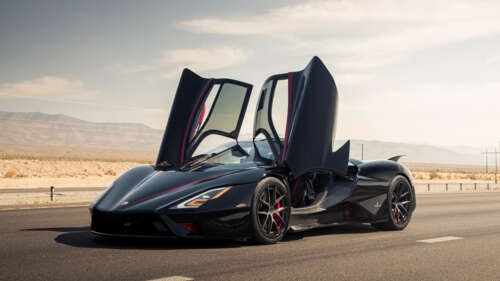 A sleek, black SSC Tuatara hypercar featuring a polished aerodynamic body. 4K (Ultra HD) wallpaper for pc download