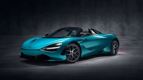 A detailed view of a high-performance McLaren 720S supercar, highlighting its aerodynamic... 4K (Ultra HD) free desktop wallpaper