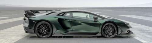 A high-performance Mansory Cabrera Lamborghini Aventador SVJ with custom aerodynamic... wallpaper