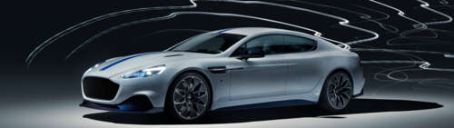 A sleek silver Aston Martin Rapide E electric luxury car. Dual UHD wallpaper photo gallery download