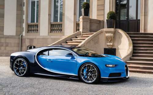 A high-performance Bugatti Chiron supercar featuring sleek aerodynamic lines and... high definition wallpaper