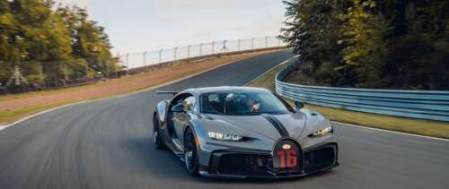 A detailed view of a Bugatti Chiron Pur Sport supercar featuring its iconic aerodynamic... UWUHD background images hd